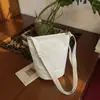 Bolsa Pequeña de Tela Sólida Casual Estilo Simple Nueva Primavera 2026 Bolso Cruzado de Hombro Tipo Cubo para Mujer Bolsa Pequeña Ligera de Viaje