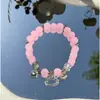 Arcoíris de verano ~ pulsera de nicho de color pequeño y fresco dopamina pulsera elástica de alta gama para mujer de verano al por mayor