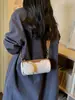 Bolsos de Mujer de Venta Caliente Transfronterizos Este Año, Moda Nueva Primavera/Verano 2026 Bolso Cilíndrico Versátil de Gran Capacidad para Hombro y Cruzado