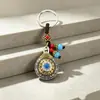 Colgante de bolsa giratorio de nueve casillas de doble cara estilo étnico, llavero, colgante, accesorio, regalo pequeño, al por mayor