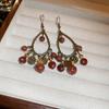 Pendientes de alta gama con borlas y gotas de agua estilo nicho bohemio retro para mujer, estilo étnico único, elegantes y de celebridades de Internet.