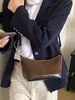 Bolso de hombro ligero de alta gama retro, estilo coreano, transfronterizo, nuevo de otoño 2026, bolso de mano casual versátil