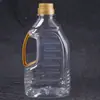 Varios Especificaciones de Barriles Transparentes Comestibles de Aceite para Mascotas Fabricante Mayorista 1.8L Sellado Plástico Barriles de Aceite de Cacahuete Barriles Vacíos Personalizados