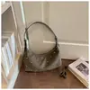 Bolso de Hombro Cruzado con Remaches 2026 Nuevo Otoño Invierno Versátil Retro Bolso de Hombro Único Nicho Elegante Cruzado Bolso Dumpling