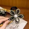 Nuevo y moderno scrunchie de flor con pedrería, pinza para el pelo de moda, accesorio para el cabello para mujer, clip versátil y elegante para moños