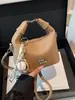 Nova Bolsa Dumpling Fashionável de Verão 2026, Popular em Lives de Streaming, Bolsa Transversal de Ombro Único Vintage com Acabamento de Luxo para Mulheres