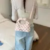 Bolsa de pulso coreana nicho da moda 2026 novo modelo bolsa simples de bolinho com bolinhas moderna de alta qualidade para ombro e transversal