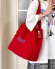 Bolsa de Lona Otoño 2025 Estilo Ins Estilo Perezoso Gran Capacidad Nueva Versátil Simple Bolso de Mano para el Trabajo Bolsa de Cordón para Viajes