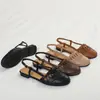 Sandalias de estilo retro para mujer, punta redonda, con borlas, para verano, suela plana, suaves, caladas, transpirables, con tira en T, zapatos de un solo color versátiles, modelo 1003-2