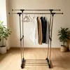 Perchero de piso de acero inoxidable de doble barra engrosada, extensible, elevable y móvil, para uso doméstico en balcones, venta al por mayor desde el fabricante