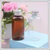Frasco plano de metal marrom de 50ml para isca de peixe, frasco dispensador de shampoo e sabonete líquido, frasco de embalagem PET para tônico