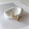 Pendientes más vendidos transfronterizos de Yanbo, pendientes de botón verticales de circonita cúbica, lujo ligero para mujer, de alta gama, sencillos, versátiles, venta directa de fábrica