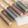 Peine de costillas superiores craneales alto esponjoso peine grande curvo para cabello rizado masajeador artefacto de peinado para damas peine para el hogar fuente de fabricantes mayoristas