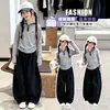 Conjunto de outfit de otoño para niña 2026 nuevo estilo infantil de otoño súper popular coreano top a rayas y pantalones de pierna ancha conjunto de dos piezas