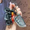 Llavero Creativo Mini Motocicleta Harley Dibujo Animado Aleación Coche de Tirar Hacia Atrás Modelo Colgante Pequeño Regalo Venta al por Mayor