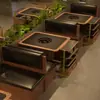 Mesa de hot pot estilo Sanchushan, mesa de barbacoa, mesa y sillas para hot pot y barbacoa con piedra de fuego sin humo, asientos tipo cabina hechos a medida para restaurantes comerciales