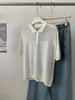 Exquisita Camiseta Polo de Manga Corta Tejida Jacquard Hueco Retro para Mujer Verano 2026 Estilo Francés Blanco Hielo Seda de Hielo