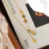 Nuevo Collar de Cobre con Borla de la Fortuna Calada Estilo Chino, Cadena para Clavícula, Cadena para Suéter, Joyería de Lujo Ligero de Alta Gama para Mujer