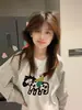 Camiseta de Manga Longa Listrada Contrastante Estilo Ins Doce e Cool para Mulheres Outono Inicial Nova Solta Casual Moda Versátil Gola Redonda Top