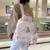 Mochila tipo bolso de mano con lazo de encaje estilo coreano 2026 nueva mochila de dibujos animados Rilakkuma mochila ligera para estudiante