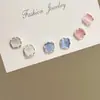 Pendientes minimalistas de ojo de gato con pasador de plata S999, Pendientes versátiles inspirados en la dopamina, Accesorios populares para las orejas, Regalo al por mayor para novia