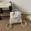 Mochila de Estilo Universitario Británico de Nuevo Estilo para Mujer Verano 2026, Bolso de Moda con Estrellas y Lunares, Bolso de Mujer Simple y Ligero al por Mayor
