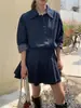 Foto Real do Novo Conjunto de Camisa Jeans Estilo Coreano Doce e Descolada com Ajuste na Cintura para Emagrecer e Saia Plissada para Primavera e Outono de 2026