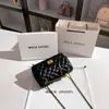 Una generación de cabello fragancia pequeña cadena de lujo ligero bolsa de axila 2024 alta sensación rombos bolso bandolera mujer venta al por mayor