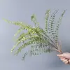 Plantas verdes artificiales en stock, manojos de helecho, hojas de helecho, hierba de helecho para decoración de paredes interiores y diseño de paisajes, césped artificial al por mayor