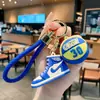 Llavero creativo de simulación de zapatillas de baloncesto AJ de goma blanda, colgante de personalidad, llavero para coche de pareja, bolsa, regalo exquisito