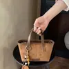 Bolso de Mano Simple Transfronterizo para Mujer, Bolso Cubo de Lujo Ligero de Nicho, Nuevo Bolso de Viaje Otoño 2026, Bolso Cruzado para Mujer