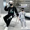 Conjunto para Niños 2026 Sudadera de Verano Pantalones Largos Niños Medianos y Grandes Ropa Infantil Suelta de Dos Piezas Elegante Adolescente Deportivo