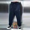 Pantalones de punto de sarga 2026 nuevo estilo para personas de mediana edad y jóvenes holgados versátiles deportivos tipo harén con puño casual pantalones largos para hombre