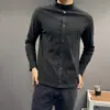 Nueva colección de principios de otoño de 2026: una camiseta de manga larga relajada, minimalista y versátil con cuello mao, diseñada para abrigar y con una estética sofisticada de 'dinero viejo'