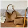 Bolsa Maternidade Textura Tecida Grande Capacidade Transfronteiriça 2026 Nova Bolsa de Mão de Luxo Leve de Nicho para o Trabalho Bolsa de Ombro