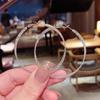Pendientes de plata S925 con forma de aguja, estilo moderno y personalidad, ideales para celebraciones en internet, con un gran anillo de viento frío exagerado, de Corea del Sur, con círculos que combinan con todo.