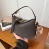 Bolsa de Mão de Luxo de Nicho Transfronteiriça para Mulheres 2026 Nova Moda Super Popular Bolsa de Ombro Bolsa Transversal Casual de Alta Qualidade