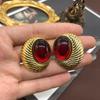 Pendientes de estilo occidental de la época medieval, chapados en oro auténtico, esmaltados en azul y verde, con forma de aguja de plata y clip para la oreja, de lujo, con luz de nicho francés.