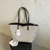 Bolso retro sencillo para mujer, nuevo modelo 2026, bolso tote de alta gama, bolso de hombro y axila de gran capacidad para el trabajo