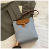 2025 Novo Estilo Moda Cor Contrastante Bolsa Balde High-End Design Nicho Versátil para o Dia a Dia Leve Bolsa Transversal para Mulheres