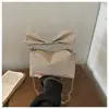 Bolso de Mano Textura Niche Francés 2026 Nuevo Bolso para Mujer Brillante Simple Bolso Cruzado Casual de Mezclilla Pequeño Cuadrado