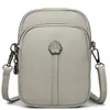 Nueva bolsa cruzada minimalista para teléfono transfronteriza con textura de cuero genuino, múltiples compartimentos, ligera, adecuada para el transporte diario, bolso de hombro estilo francés con temática de bosque para mujer