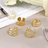 Shein Clip para Hélice de Oreja Hueso Creativo Simple Sin Perforar Juego de Cinco Piezas Pendientes Personalizados Dorados con Corte de Hoja Clip de Oreja en Forma de C