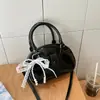 Bolso de Mano Estilo Bolos Coreano de Nicho para Mujer Modelo Nuevo 2026 Bolso Versátil de Hombro Cruzado Texturizado Bolso Pequeño Cuadrado para Viajes