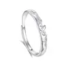 Anillos de pareja de plata pura s999, diseño creativo de nicho, anillo abierto ajustable de alta gama, anillo moderno y simple