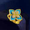 Europa e Estados Unidos anel cruzado novo RC diamante flor de quatro pétalas anel feminino luxo leve diamante trevo design popular anel