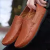 Fábrica una generación de zapatos de cuero transfronterizos algodón opcional zapatos de cuero brillante zapatos de frijol huecos forrados de felpa zapatos de cuero de alta calidad