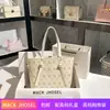 Una generación de bolsa de asas de alta sensibilidad para presbicia 2022 nueva de gran capacidad bolsa cubo para bebé para mujer verano al por mayor