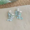 Pendientes frescos y dulces estilo vacacional con borlas florales, borlas de perlas estilo francés, pendientes llamativos de lujo ligero y alta gama