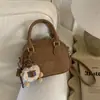 Bolsa de Bowling Retrô de Nicho para Mulheres Moda Inverno 2025 Nova Bolsa de Ombro Transversal Bolsa de Mão Estilosa